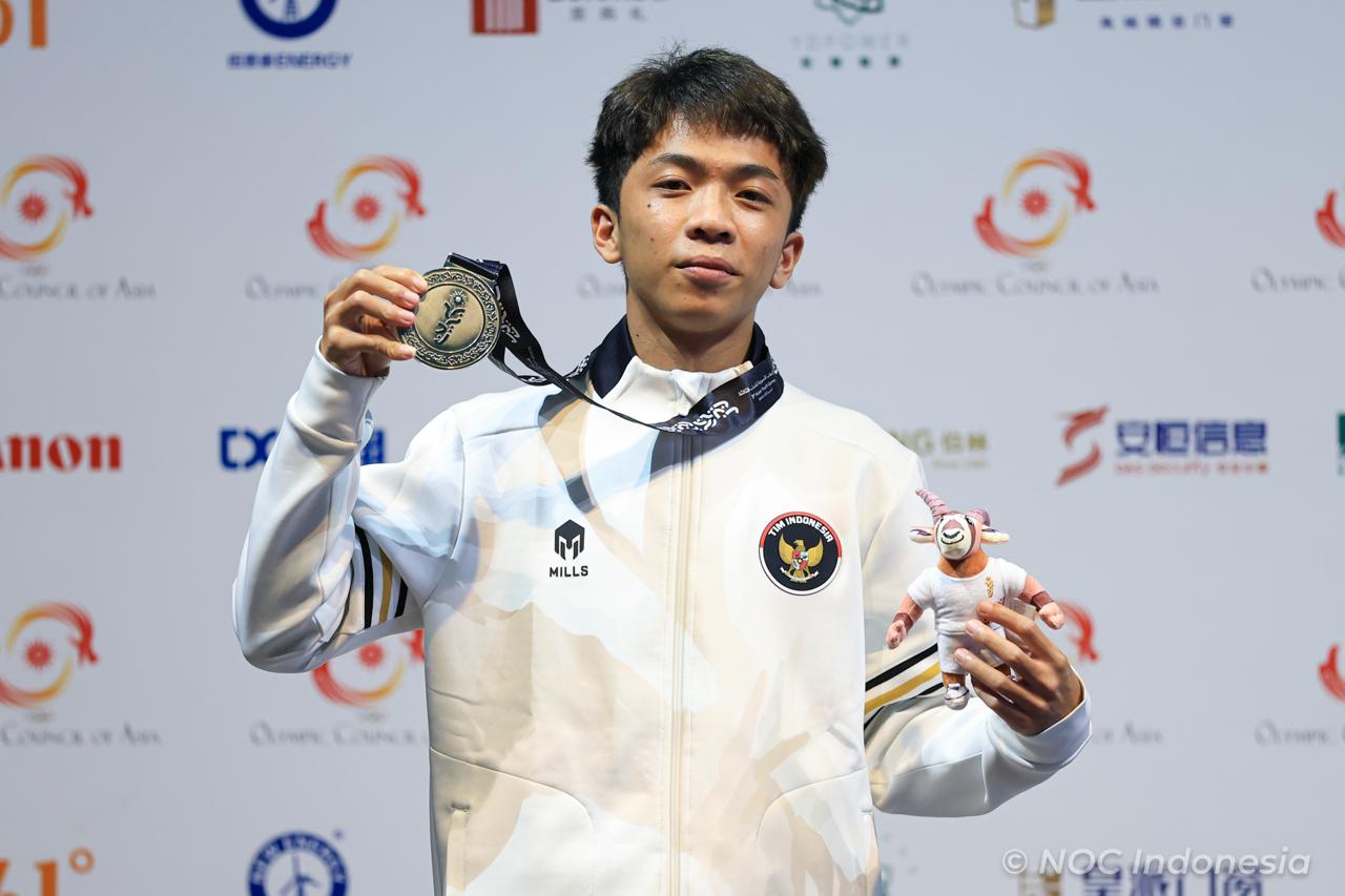 Indonesia Olympic Commitee - Stellar Debut: Michael Julius Cezar Wins Silver for Indonesia at the 2025 Asian Youth Games