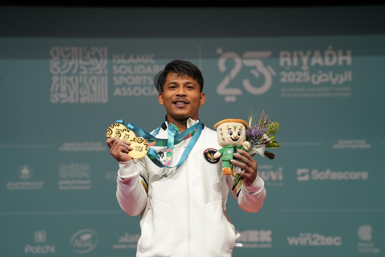 Indonesia Olympic Commitee - Muhammad Husni Wins Golden Hattrick for Indonesia, Bringing Weightlifting Total to 9 Medals at the Islamic Solidarity Games 2025