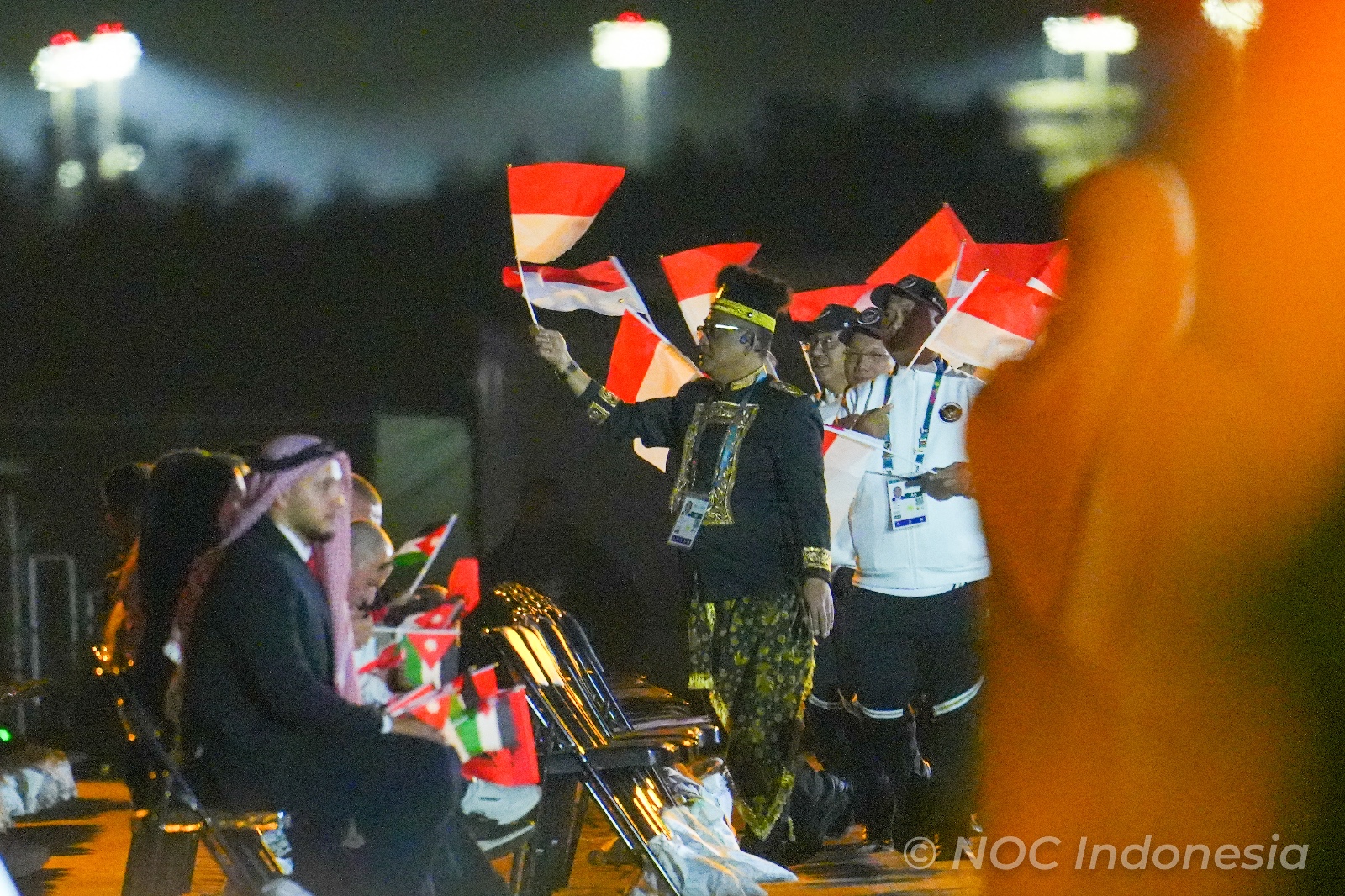 Indonesia Olympic Commitee - Team Indonesia Showcases Symbol of Glory and Honor through Borneo Traditional Attire at the Islamic Solidarity Games 2025 Opening Ceremony